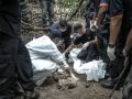 ماليزيا تحقق مع أفراد شرطة للاشتباه في علاقتهم بمقابر جماعية للمهاجرين